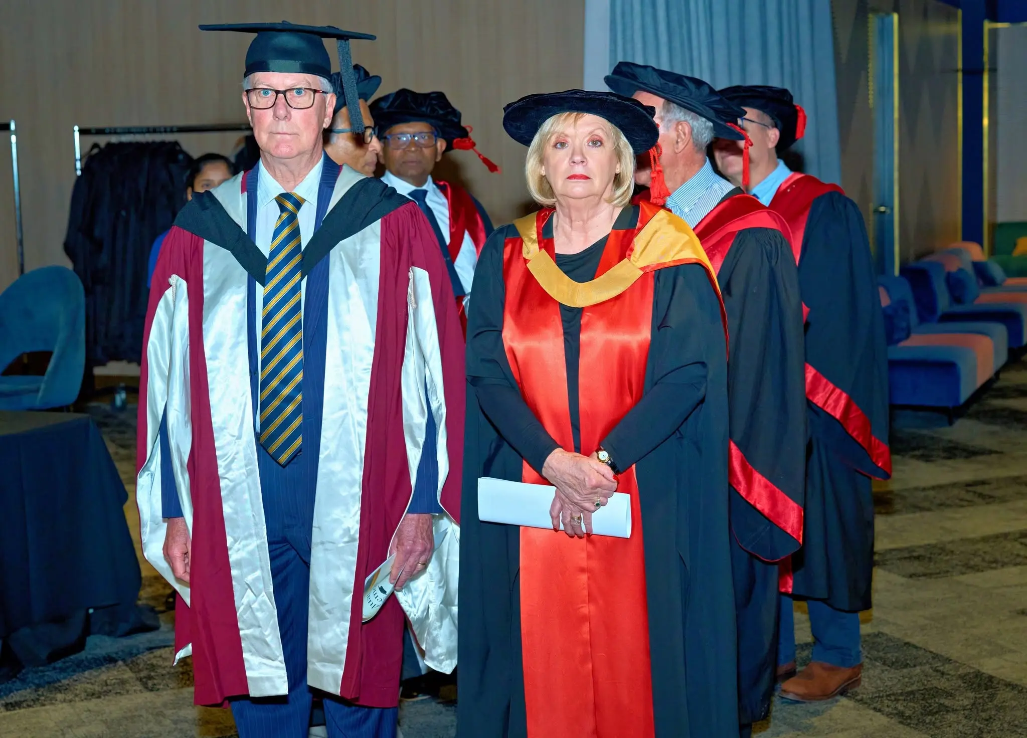 IHM graduate portrait on ceremony stage